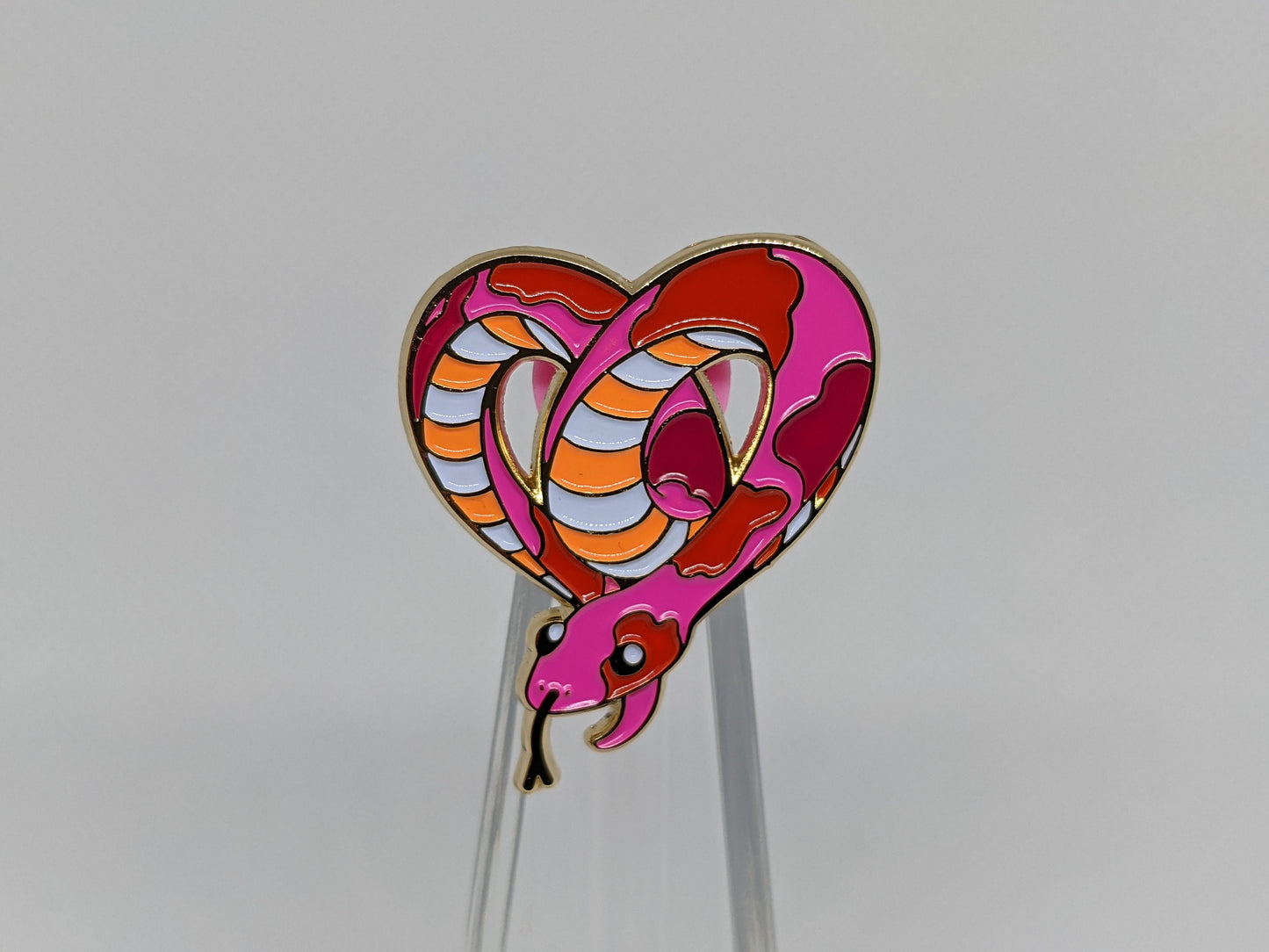 Subtle Lesbian Pride Pin | Heart-Shaped Snake Enamel Pin in Sunset Lesbian Flag Colors | LGBTQ+ Danger Noodle