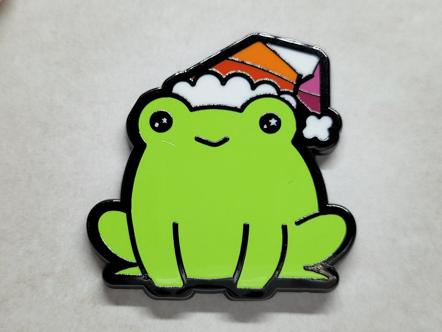Lesbian Frog Pin | Chibi lgbtq Frog Enamel Pin with WLW Lesbian Pride Flag Beanie or Santa Hat for Gay Christmas