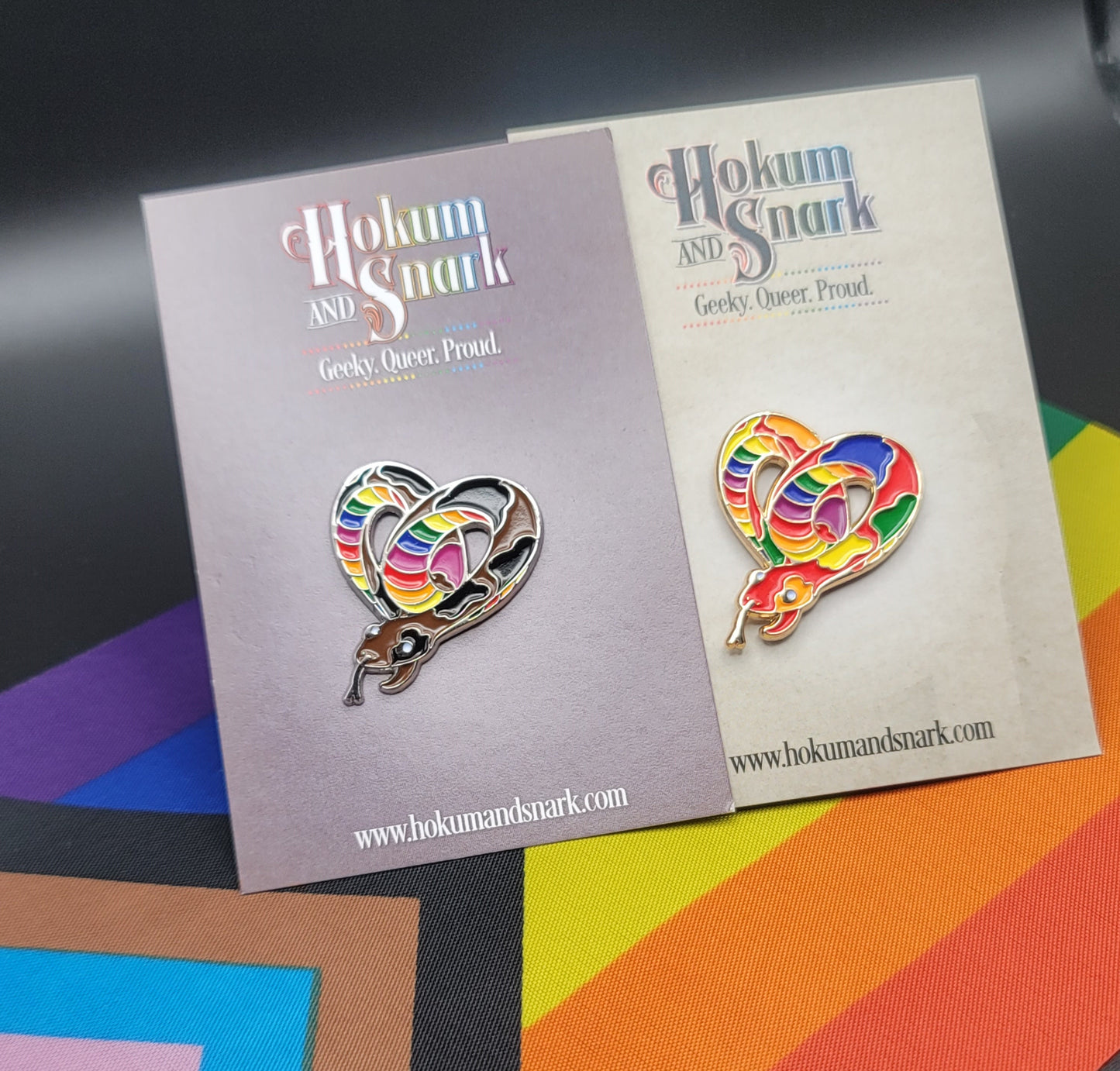 Subtle Pride LGBTQ Rainbow Pride Flag Heart-Shaped Snake Enamel Pin | Brown body, Black Spots, Rainbow Striped Stomach