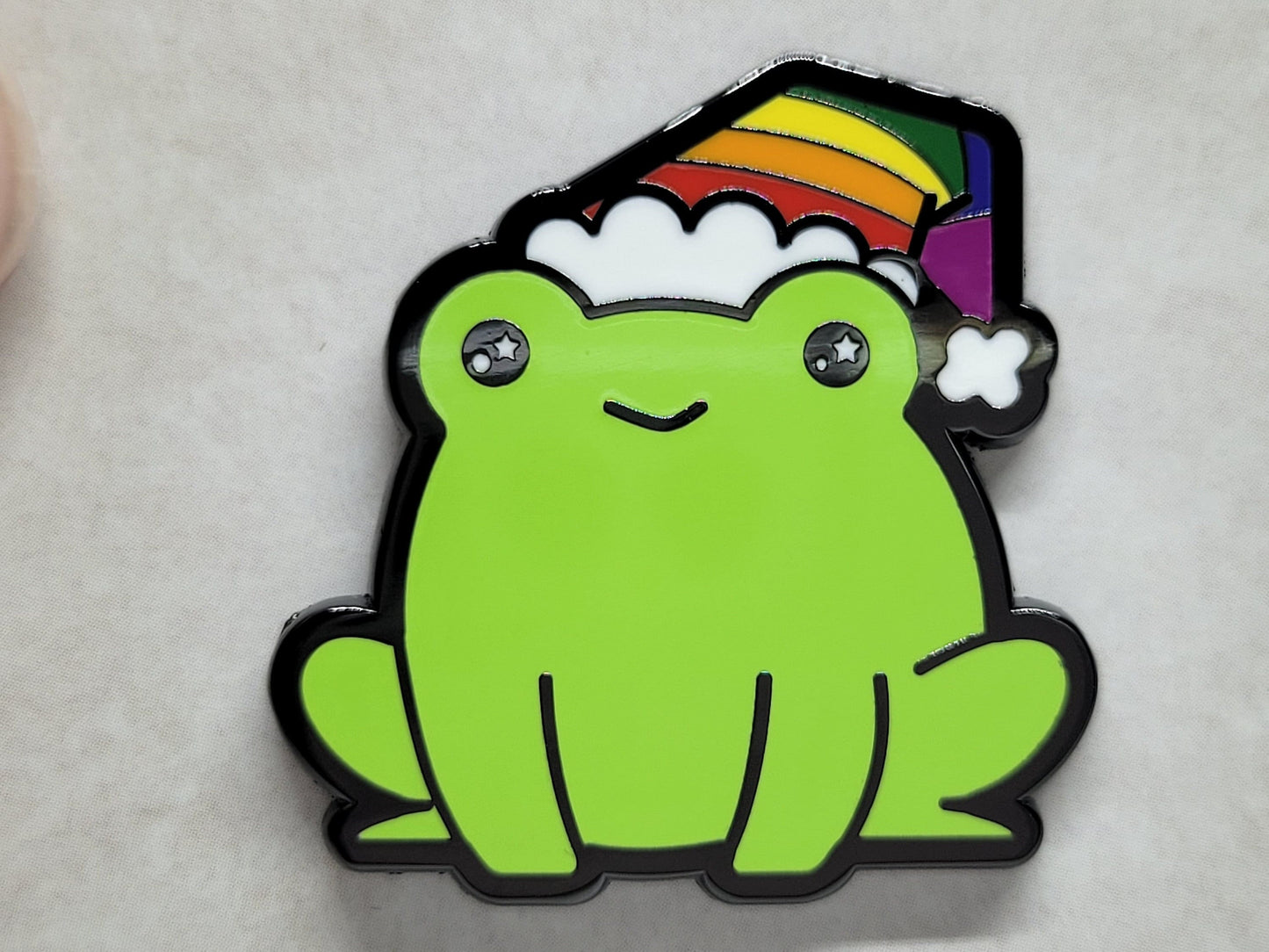 Subtle Gay Frog Pin | Chibi Frog Wearing Rainbow Gay Pride Flag Beanie or Santa Hat for Gay Christmas or Every Day