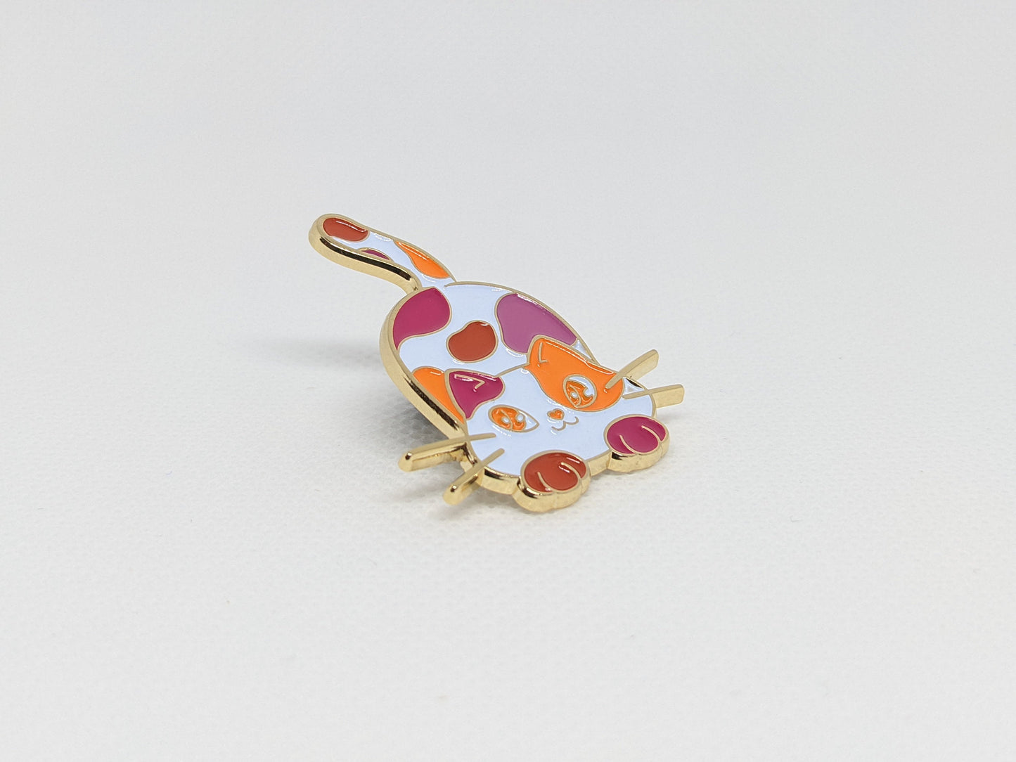 Lesbian Pride Chibi Calico Cat Enamel Pin in Sunset Lesbian LGBT Pride Flag Colors | Subtle Pride Jewelry