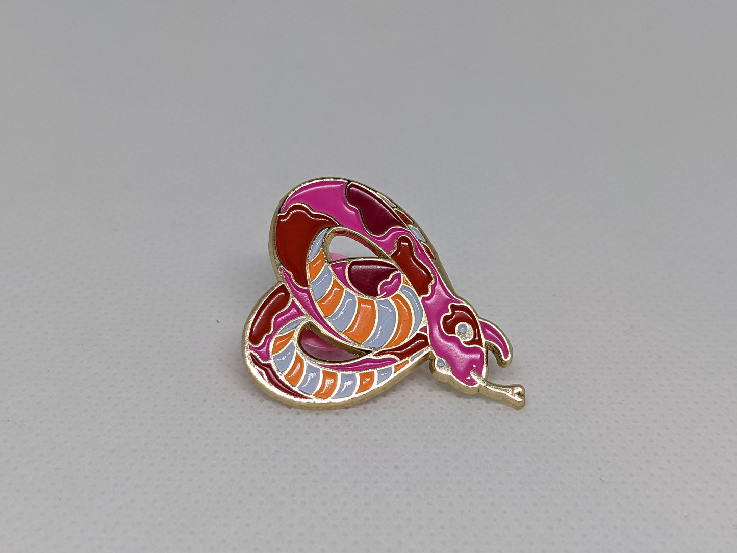 Lesbian Pride Heart-Shaped Snake Enamel Pin in Sunset Inclusive Lesbian Flag Colors