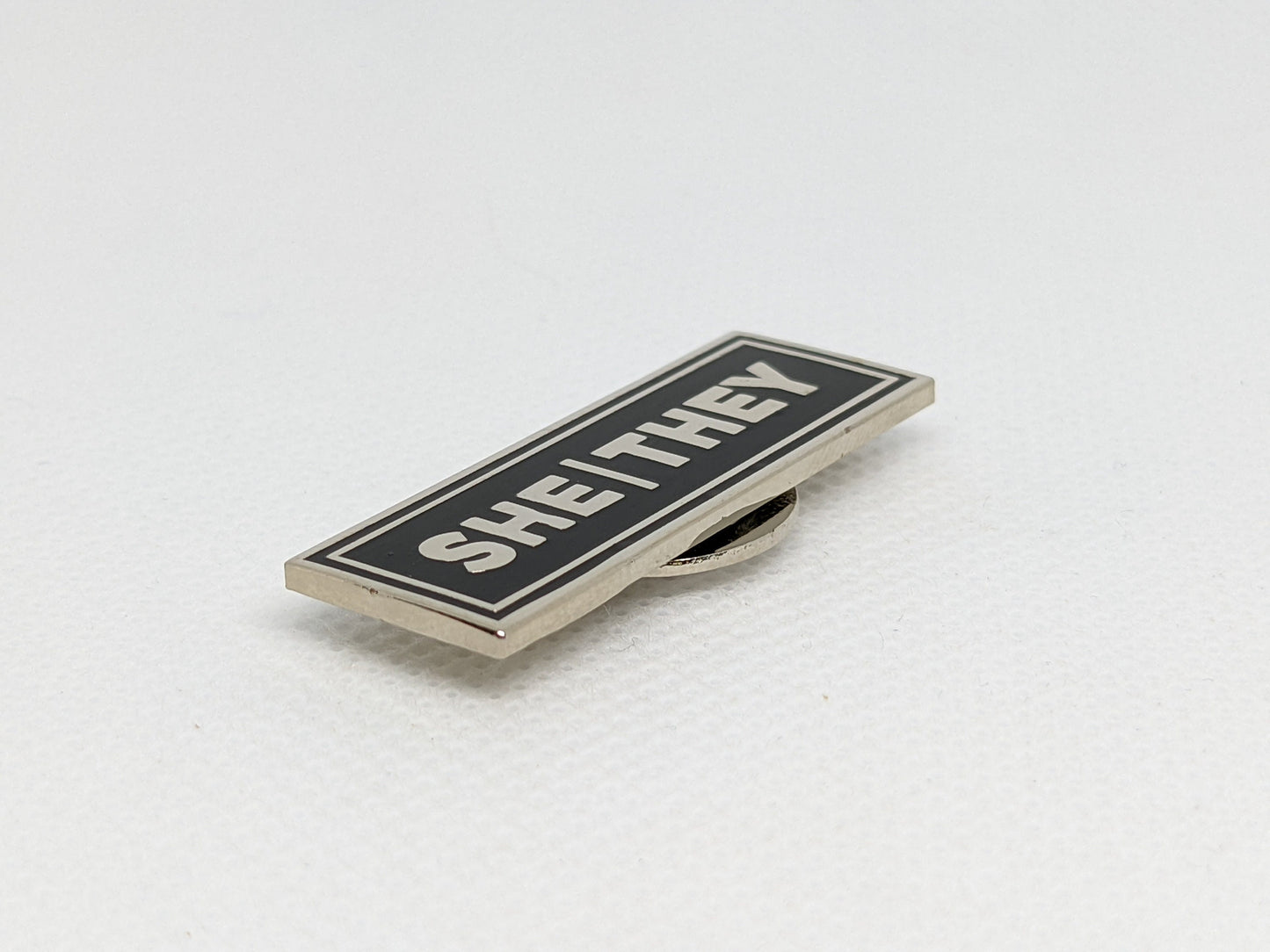 She/They Rectangle Pronoun Pin or Magnet Back Silver or Gold Hard Enamel 1.5 by .5 in | Femme Nonbinary Pronoun Badge