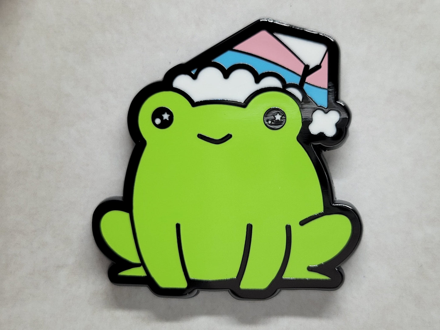 Trans Frog Pin | Chibi Transgender Frog Wearing Beanie with LGBTQ Trans Pride Flag Colors | Subtle Pride Gay Frog Enamel Pin