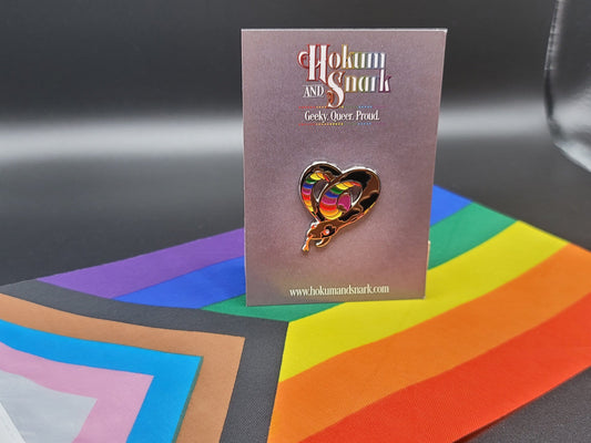 Subtle Pride LGBTQ Rainbow Pride Flag Heart-Shaped Snake Enamel Pin | Brown body, Black Spots, Rainbow Striped Stomach