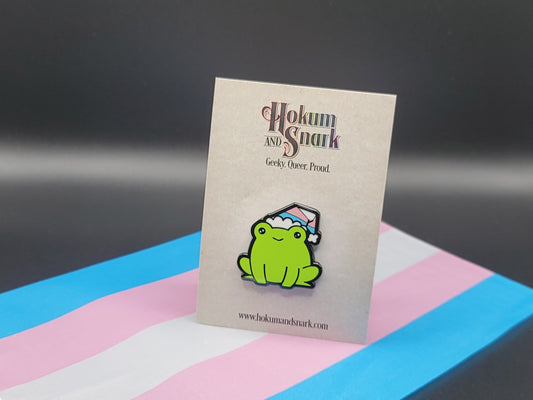 Trans Frog Pin | Chibi Transgender Frog Wearing Beanie with LGBTQ Trans Pride Flag Colors | Subtle Pride Gay Frog Enamel Pin