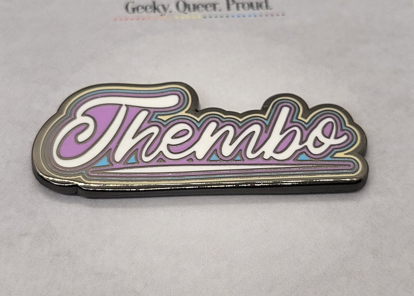 Thembo Nonbinary Hard Enamel Pronoun Badge