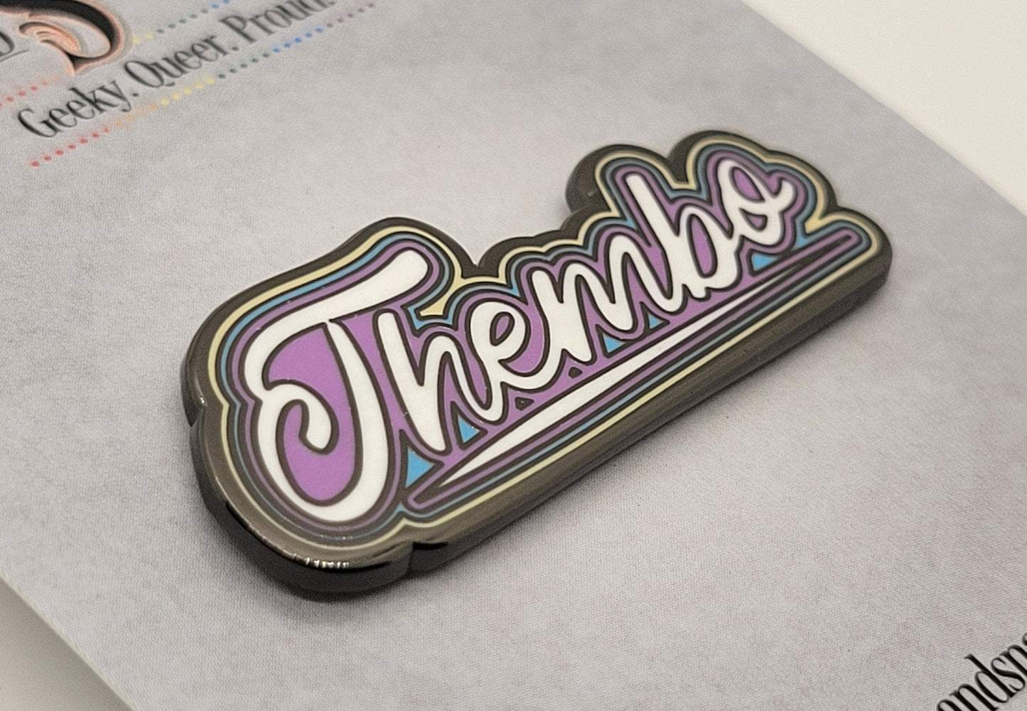 Thembo Nonbinary Hard Enamel Pronoun Badge